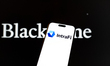 The Blackstone and IntraFi logos are seen in this illustration photo taken in Warsaw, Pola...