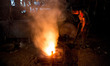 A boy is powering up the furnace. Ship building industry in Bangladesh spreading rapidly w...