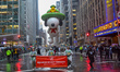 The Beagle Scout Snoopy heads down Sixth Avenue during the 98th Macy's Thanksgiving Day Pa...
