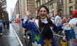 A member of the Artist Clowns hits the photographer with confetti during the 98th Macy's T...
