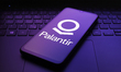 The Palantir Technologies logo appears on the screen of a smartphone in Reno, United State...