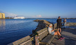 People look at the Bornholmslinjen ferry going to Bornholm Island in Ystad, Sweden, on Aug...