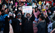 Citizens cheer after the impeachment of President Yoon Suk-yeol is passed in Seoul, South...