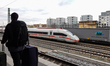 A Deutsche Bahn Intercity-Express (ICE) train passes through Munich Laim station in Bavari...
