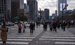 Citizens cross a pedestrian walkway at Gwanghwamun Square in Seoul, South Korea, on Decemb...