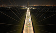 Vehicles perform a static load test on the Baguazhou Yangtze River Bridge in Nanjing, Chin...