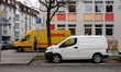 A DHL delivery vehicle parks in a residential area in Munich, Bavaria, Germany, on Decembe...