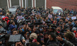 Media persons are seen during a protest outside the chief minister's residence to demand t...