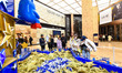 Actors participate in a Christmas Eve game activity at a shopping mall in Nanjing, Jiangsu...