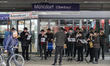 A brass band plays wind instruments at Muhldorf/Inn Train Station in Bavaria, Germany, on...