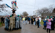 In Orlivka, Ukraine, on December 24, 2024, a group of young men dressed in military unifor...