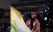 An Iranian schoolgirl looks on while participating in a ceremony at Azadi Stadium in weste...