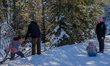 Locals and tourists take a winter walk in Krun, Garmisch-Partenkirchen, Upper Bavaria, Bav...