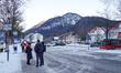 Passengers wait for a bus at Mittenwald station in Bavaria, Germany, on December 29, 2024....