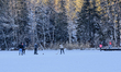 People play ice hockey on the frozen Lake Schwansee in Schwangau, Fussen, East Allgau, Bav...
