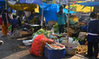 Vegetable vendors wait for customers at their roadside stalls in Siliguri, India, on Janua...