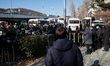 A police riot squad stands by to maintain order as around 30 supporters of impeached Presi...