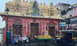 People sell items from carts outside the Sree Hanuman Swamy Temple in Thiruvananthapuram,...