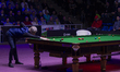 Neil Robertson of Australia competes against Shaun Murphy of England during the bronze med...