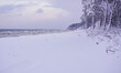 A view of the snow-covered beach of the Baltic Sea is seen in Karwienskie Blota, Poland, o...