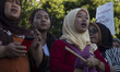 Women activist gathered infront of Indonesian palace to condemn the act of 14 boys from Be...