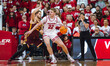 Wisconsin Badgers forward Steven Crowl #22 backs down Minnesota Golden Gophers forward Par...