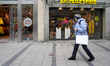 In Munich, Germany, on December 11, 2025, shops offer customers discounts even before the...