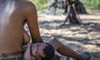 San woman with her child in the Living Museum of the Ju’Hoansi-San, Grashoek, Namibia 