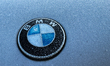 Hoarfrost is seen on BMW car logo in Poland on January 18, 2025. 