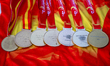 A close-up shows the seven consecutive medals won by Felipe Orts from 2019 to 2025, highli...