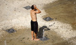 People face a hot day in Sao Paulo,  Brazil, on January 26, 2025. The city of Sao Paulo re...