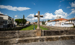 A cross stands on a bridge over the Corrego do Lenheiro (Woodcutter Creek) in Sao Joao del...