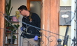 New York City Police Department crime scene unit investigators process the scene and colle...
