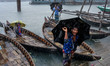 A boatman calling passengers who wants to cross the river in Dhaka, Bangladesh, on May 9,...