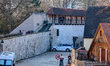 People enjoy a sunny winter day in the medieval Bavarian town of Noerdlingen in Swabia, Do...