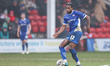 Number 12, Tyrone Williams of Chesterfield, is in defensive action during the Sky Bet Leag...