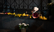 People pay their respects to the two children who died in Batumi on the territory of the '...