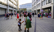People walk to the Oktoberfest festival grounds at Theresienwiese in Munich, Germany, on S...