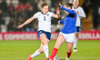 Ella Morris (2, England) is challenged by Margaux Le Mouel (15, France) during the Nationa...
