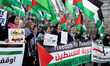 People attend a pro-Palestine demonstration at Wittenbergplatz in Berlin, Germany, on Febr...