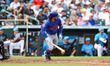 New York Mets player Chris Williams #97 doubles during the sixth inning of a spring traini...
