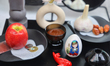 Traditional items adorn a Haft Sin (Haft Seen), an arrangement of seven symbolic items tha...