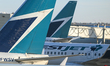 CALGARY, CANADA - MARCH 4, 2025:Westjet aircraft parked at Calgary International Airport,...