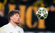 Gregor Kobel of Borussia Dortmund  looks on during the Champions League round of 16 match...