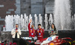 Formula 1 drivers Charles Leclerc from team Ferrari and Lewis Hamilton greet the supporter...