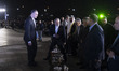 Iranian Foreign Minister, Abbas Araghchi, gestures as he leaves a ceremony in western Tehr...