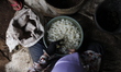 Workers peel sugar palm fruit in Padasuka Village, Garut Regency, West Java, on March 16,...