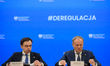 Polish Prime Minister Donald Tusk (R) and Minister for the European Union Adam Szlapka (L)...