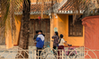 Colorful houses modeled after Hoi An's old town line the pathways of Hoi An Park in Thanh...