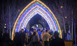 Iranian families walk through the New Year's urban light decoration in a walking area outs...